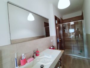 VILLA A SCHIERA CON GIARDINI PRIVATI E BOX AUTO