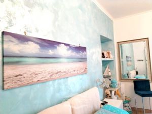 VILLA BIFAMILIARE SU PIU' LIVELLI CON CORTILE INTERNO