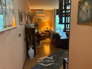 VILLA A SCHIERA CON GIARDINO DI 50 MQ. CAMINO E BOX AUTO