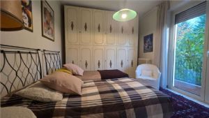 APPARTAMENTO IN VILLA CON GIARDINO E BOX