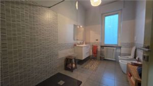 APPARTAMENTO IN VILLA CON GIARDINO E BOX