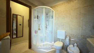 Appartamento con giardino in bifamiliare