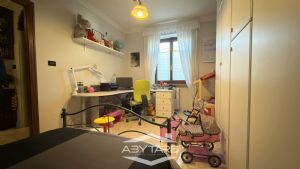 Appartamento con giardino in bifamiliare