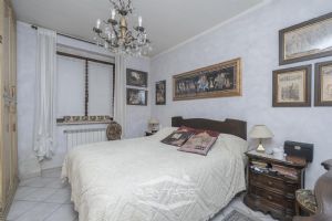 VILLA A SCHIERA CON GIARDINO E BOX