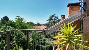 Elegante appartamento con mansarda Torino precollina