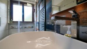 Elegante appartamento con mansarda Torino precollina